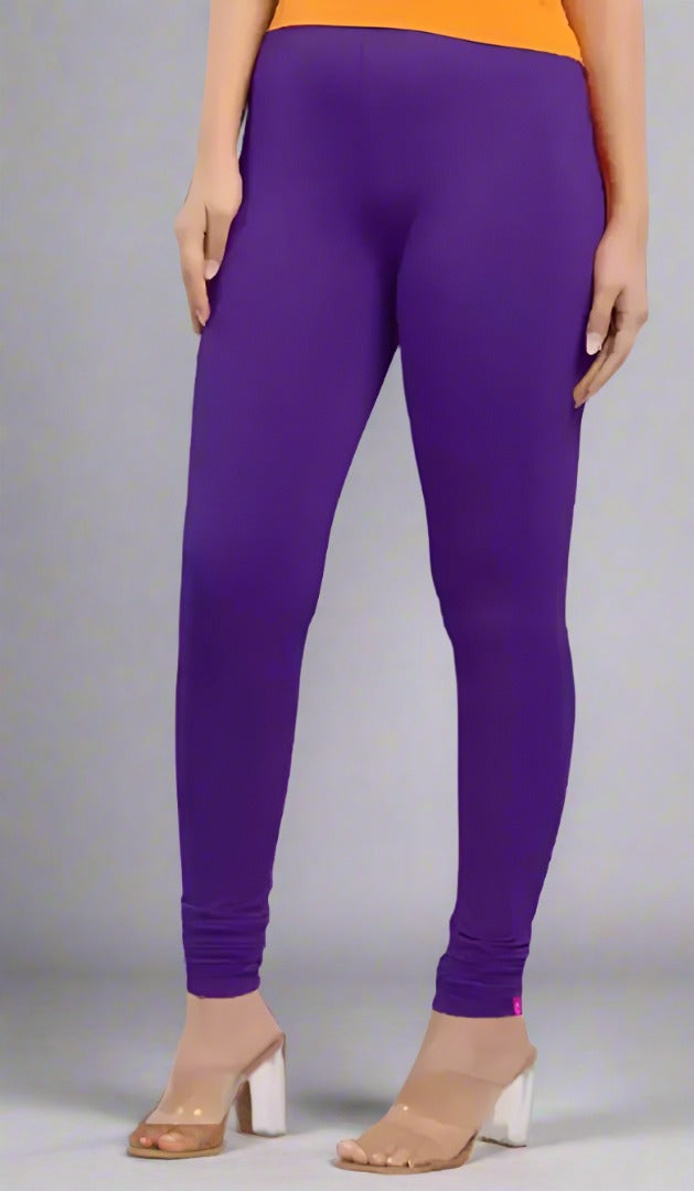 Enhance your wardrobe with our stylish and comfortable Polyester Solid Leggings for women. Made with modern influences, these leggings offer a cool and chic look, while providing maximum comfort. Perfect for any occasion, these leggings are a must-have for the fashion-forward woman.